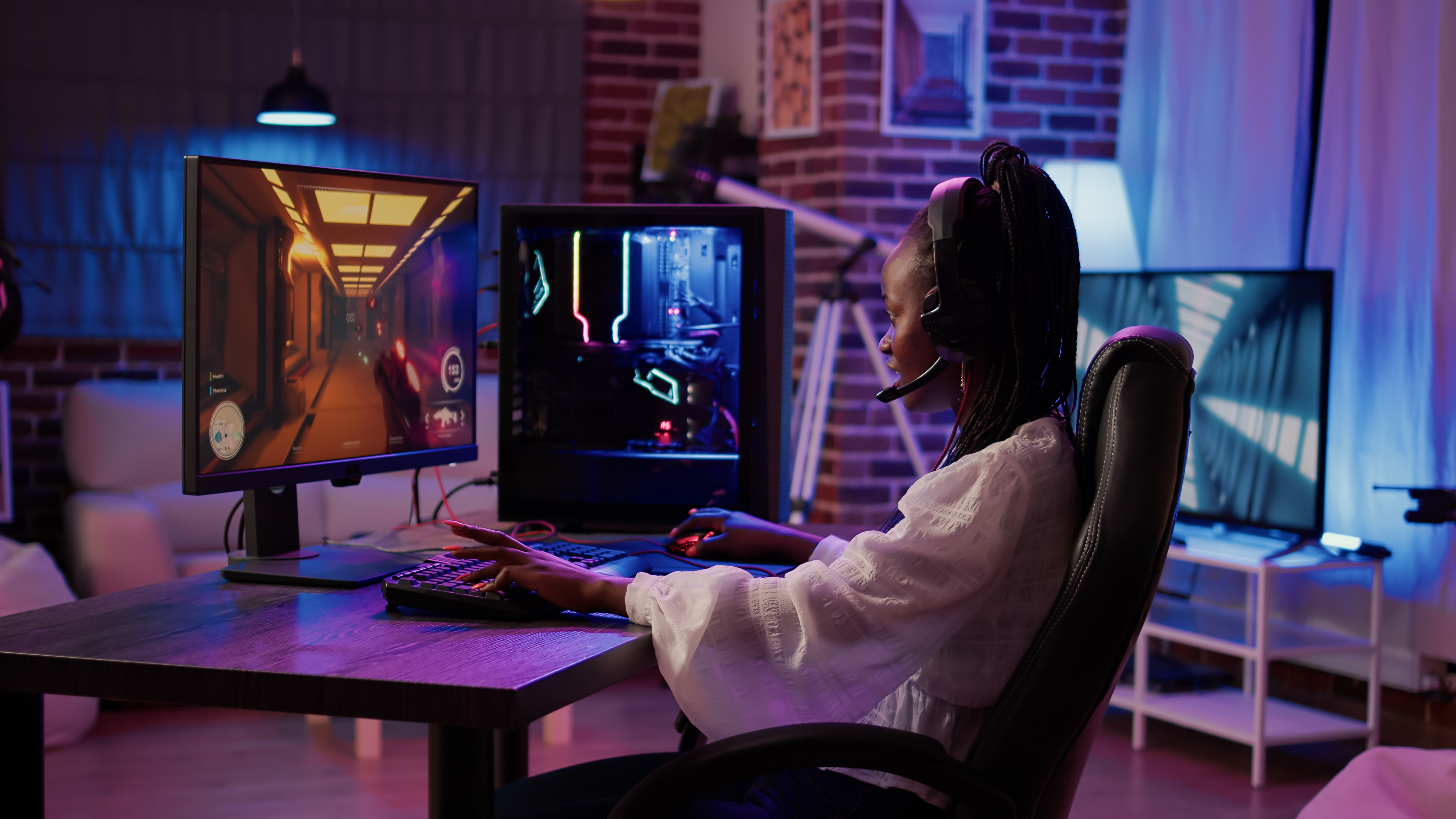 Streamer playing an FPS in her in home studio